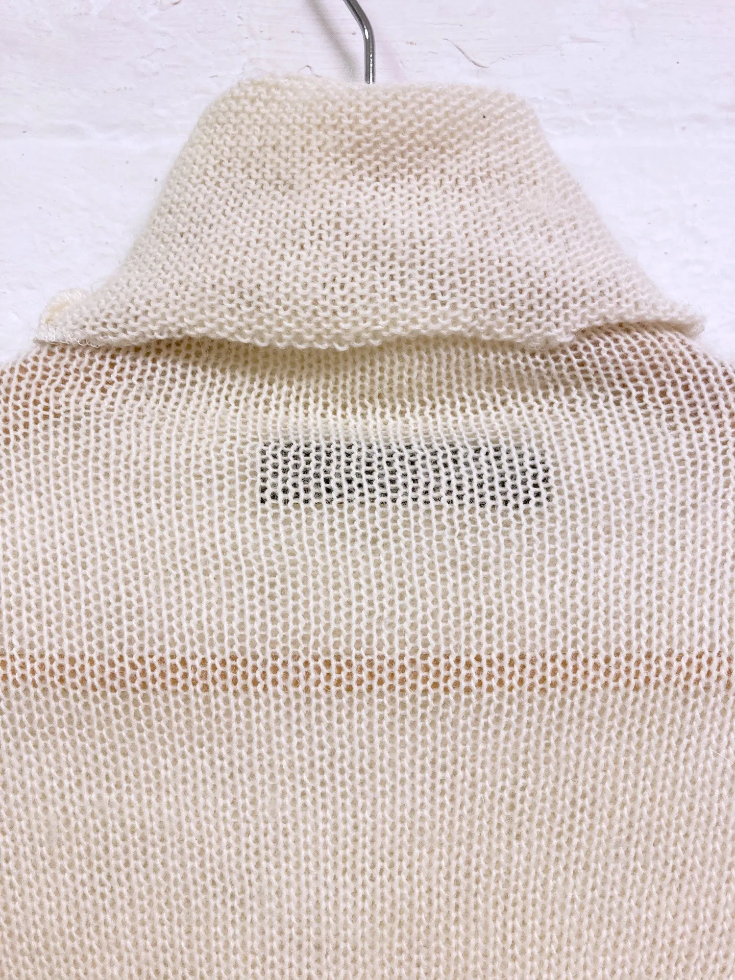 Jean Colonna cream loose knit turtleneck with extra long sleeves