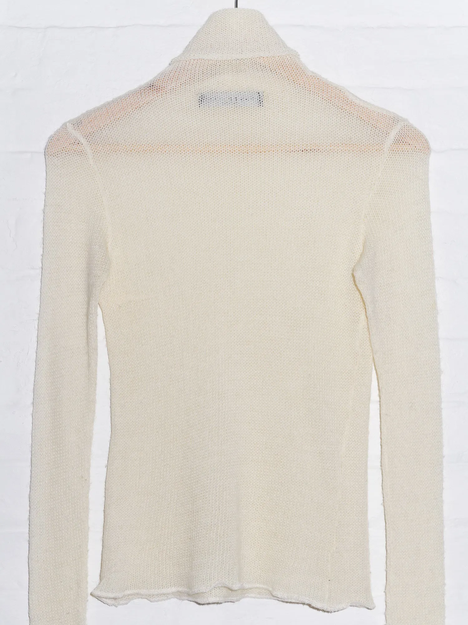 Jean Colonna cream loose knit turtleneck with extra long sleeves