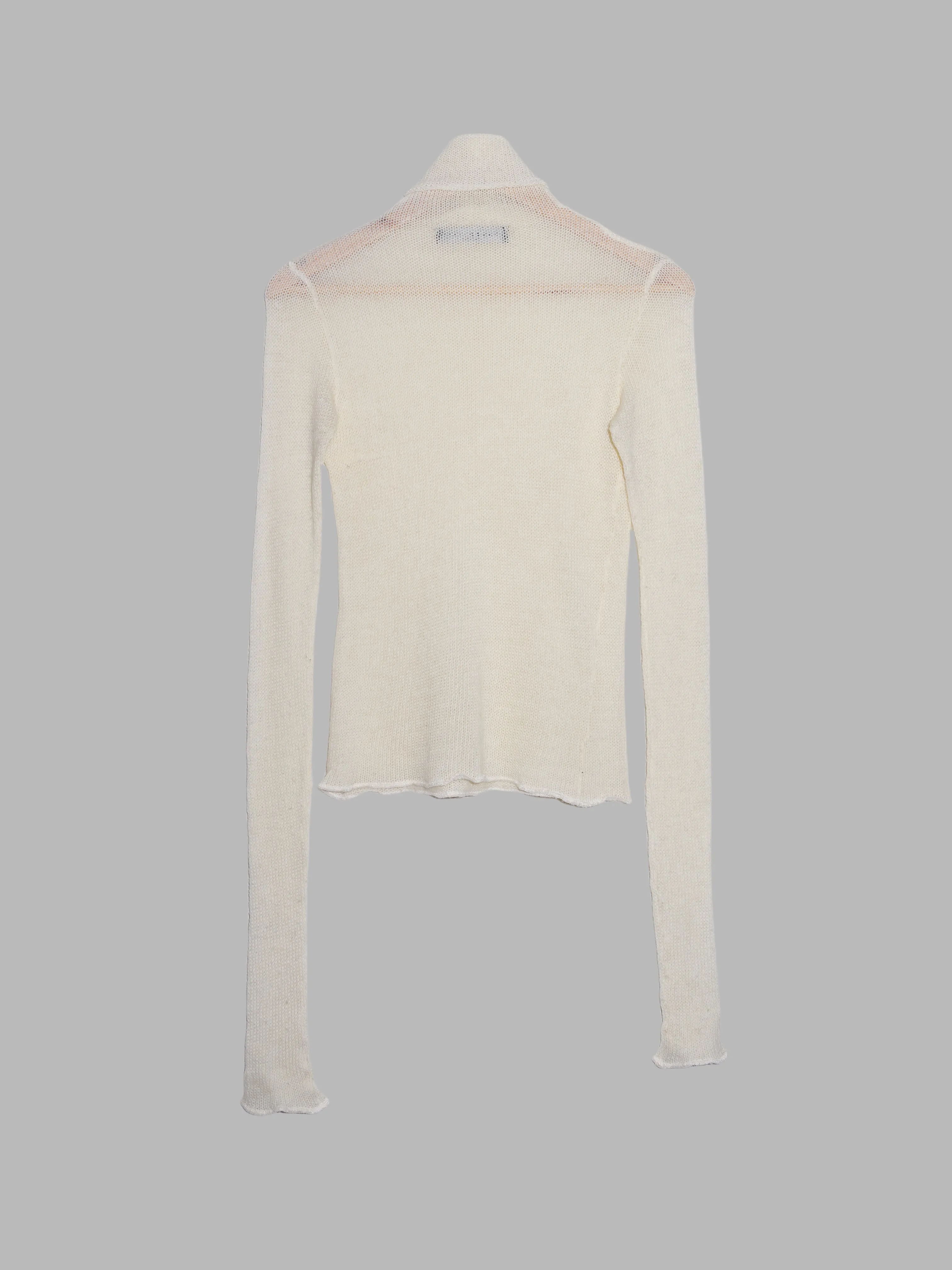 Jean Colonna cream loose knit turtleneck with extra long sleeves
