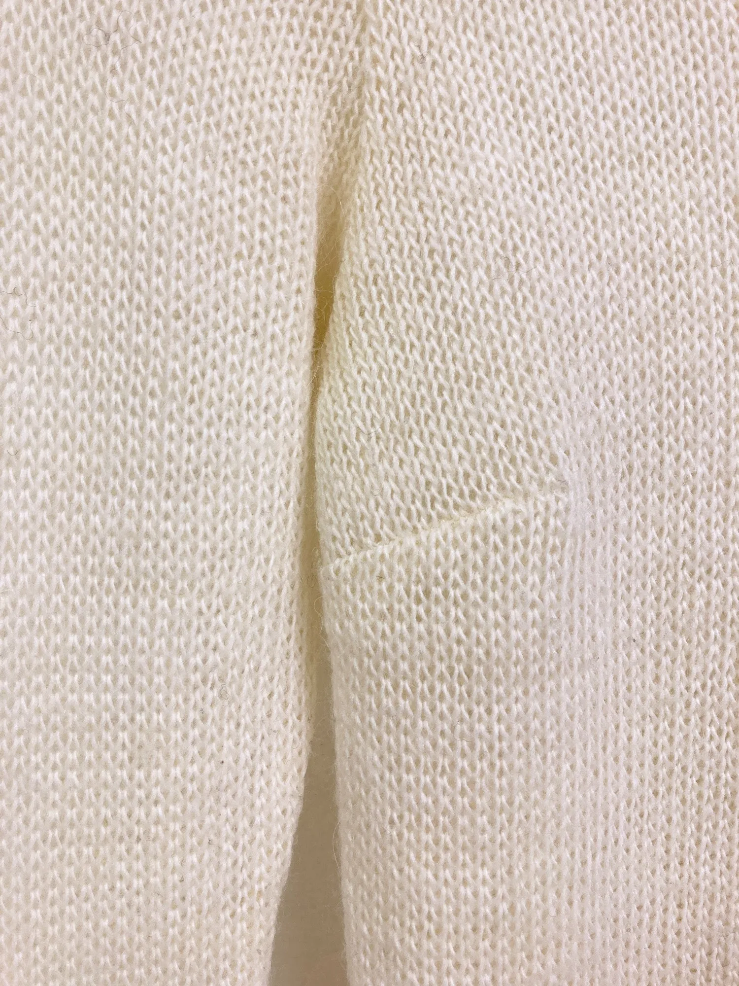 Jean Colonna cream loose knit turtleneck with extra long sleeves