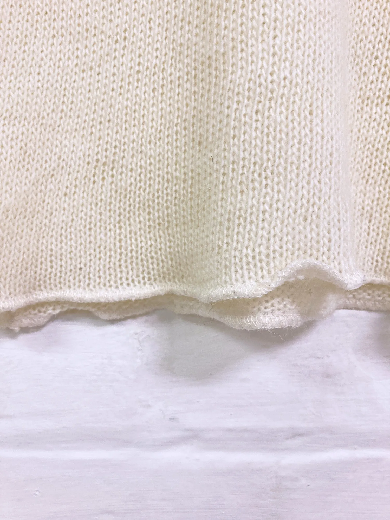 Jean Colonna cream loose knit turtleneck with extra long sleeves